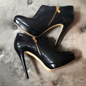Women size 10M 5 inch heel boots